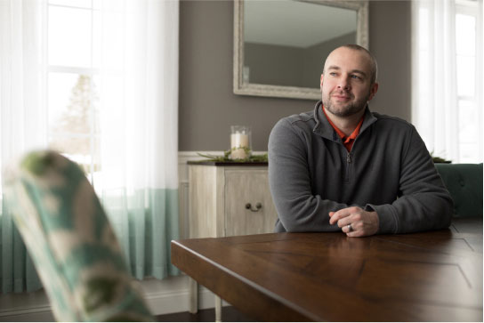 Man looking towards a window